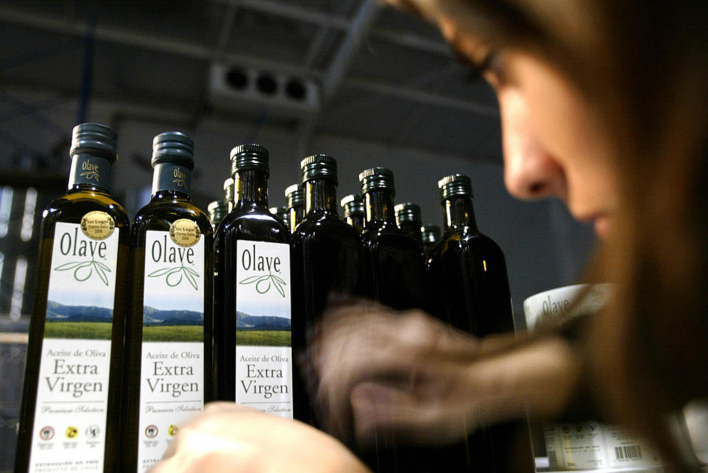 Vegetable Oil-52909066 woman choosing vegetable oil