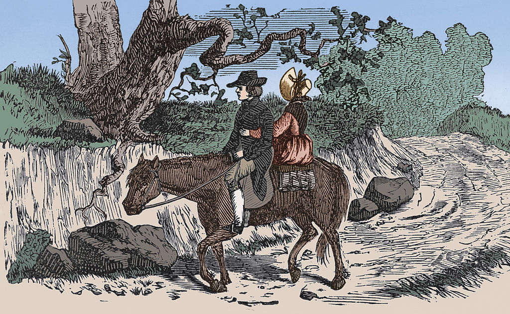 Man and woman riding horses