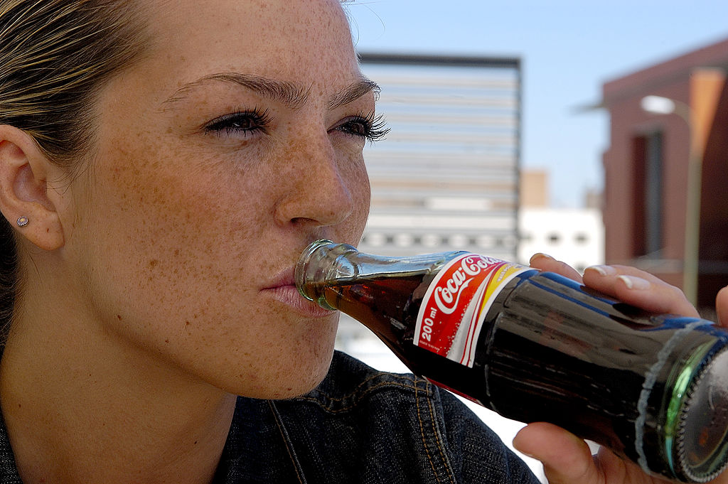 woman-drinking-a-coke