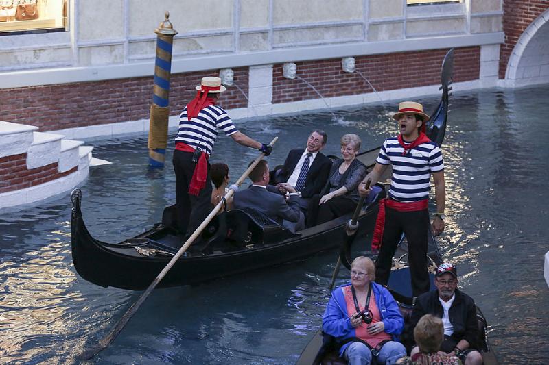gondolas 483475861 people riding in gondolas in las vegas