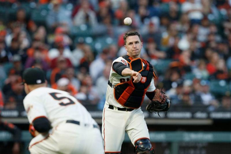 Buster Posey throwing ball 