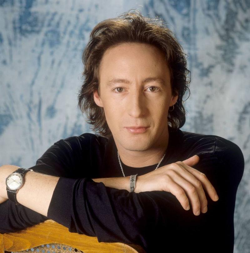 Julian poses for a professional headshot.