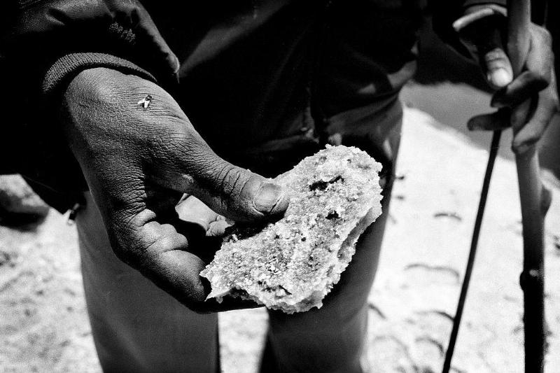 Man holding a salt rock 