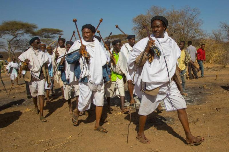 Men in white clothes 