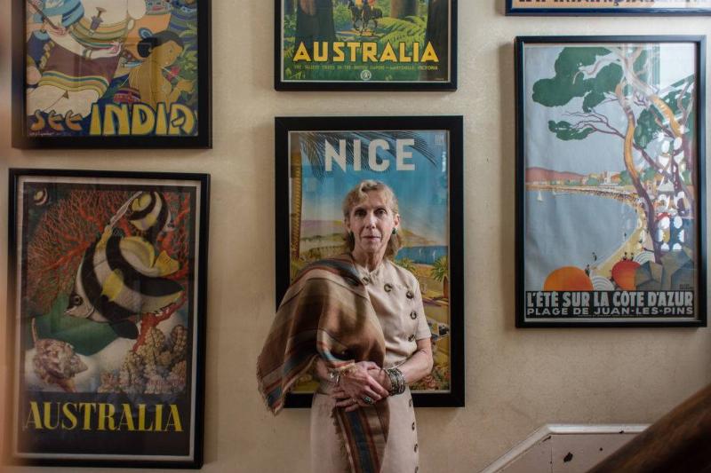 woman with vintage posters -657551218