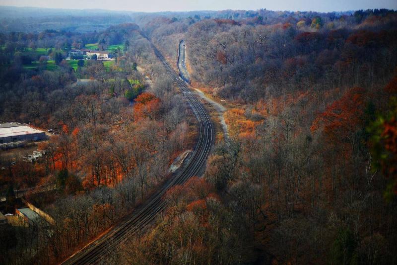 Train tracks run along Dundas Peak.