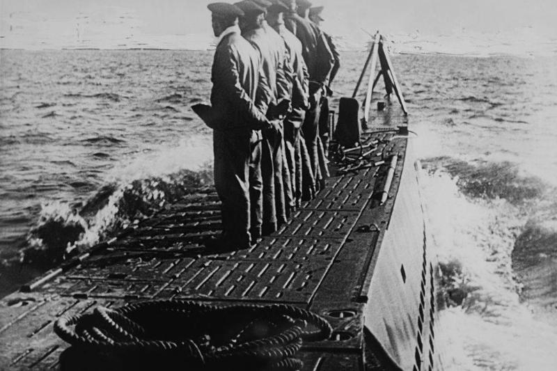 Men standing on the deck 
