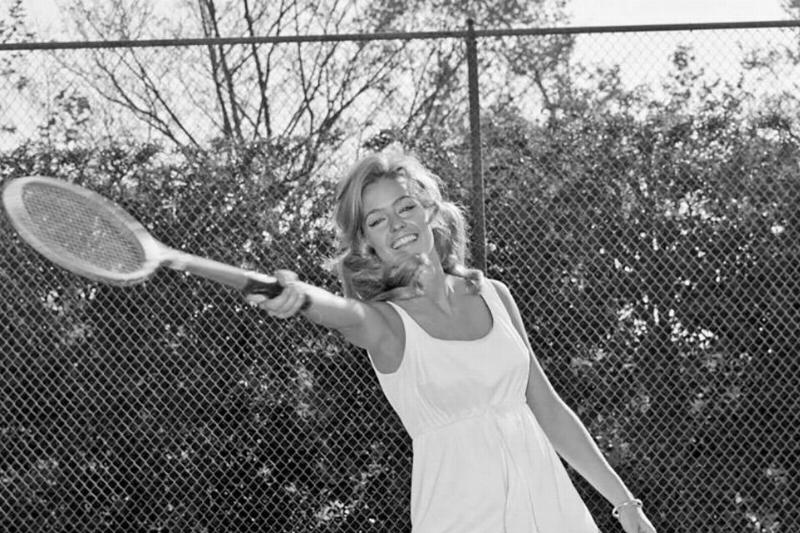 Fawcett posing for a tennis portrait 