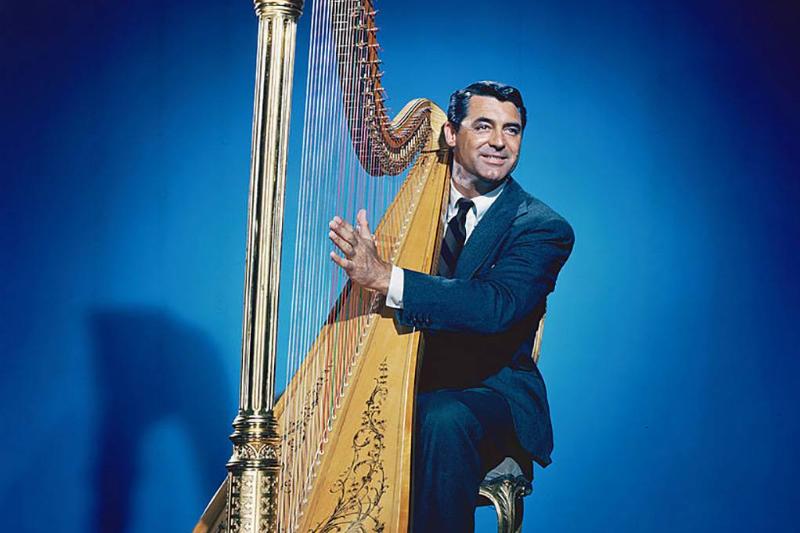 Grant playing the harp 