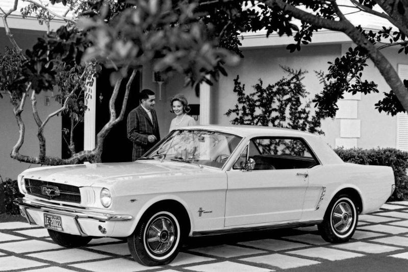 Couple In Front Of Mustang 