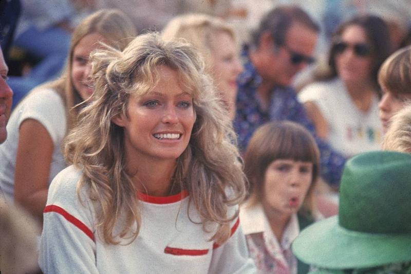 Fawcett at a tennis match