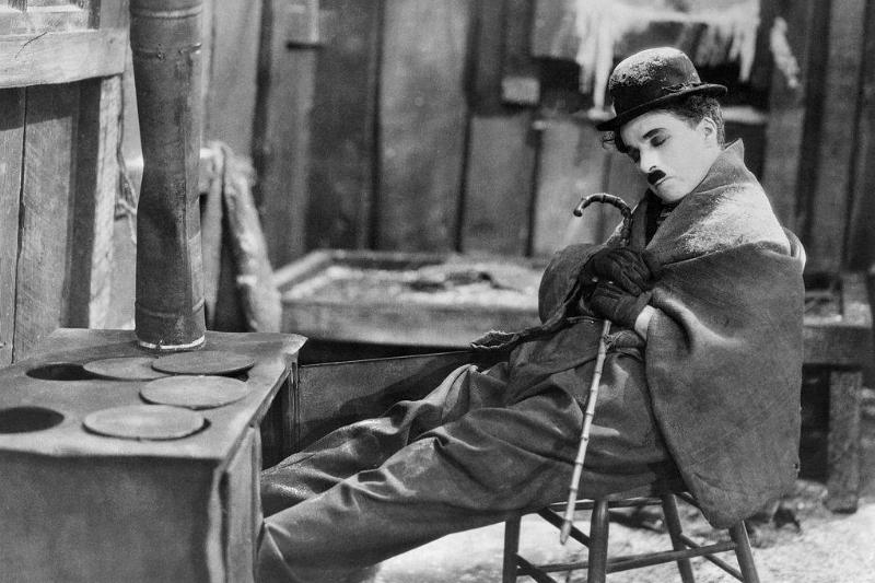 charlie chaplin in a movie still from The Gold Rush
