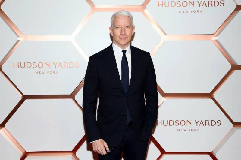 cooper posing on a red carpet