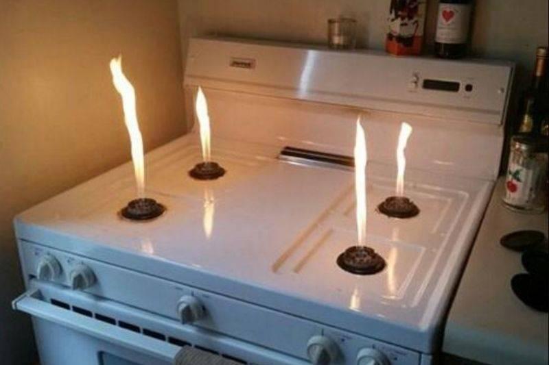 a gas stove without the covers on 
