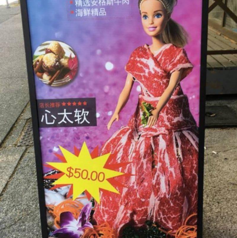 a Barbie wearing a meat dress 