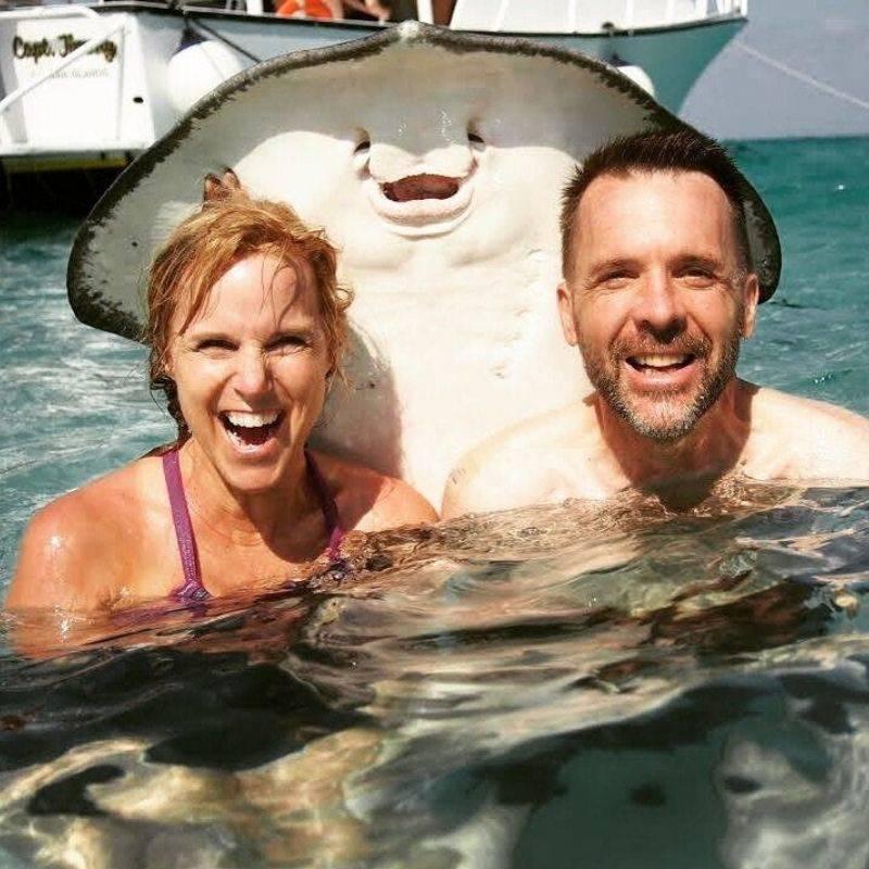 couple met a friendly sting ray 