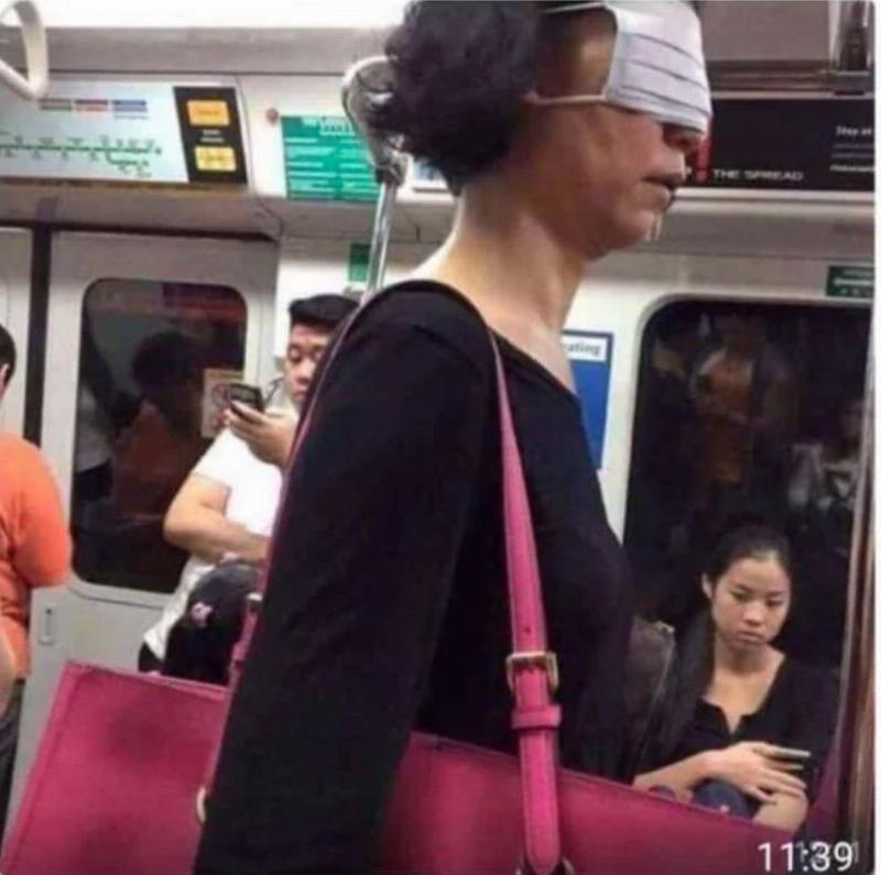woman wears protective mask over eyes