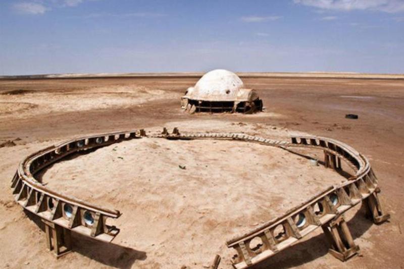 metal work on the ground in the desert