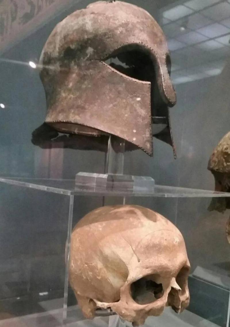 old helmet and human skull top