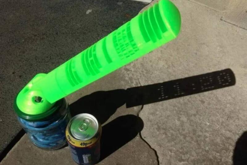 physical sundial translates shadow into digital clock reading in shadow