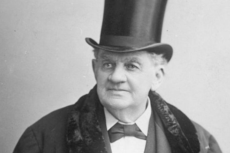 p.t. barnum wearing a suit and top hat