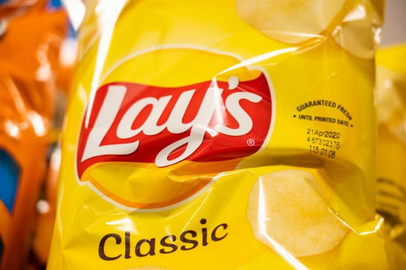 Lay's potato chips pack on a grocery store shelf