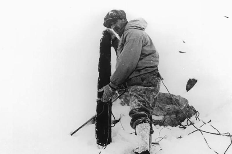 Man with piece of wood 