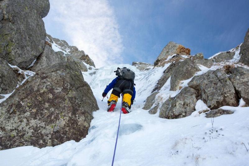 Man climbing mountain 