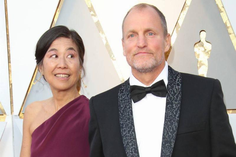 Laura Louie (L) and Woody Harrelson attend the 90th Annual Academy Awards