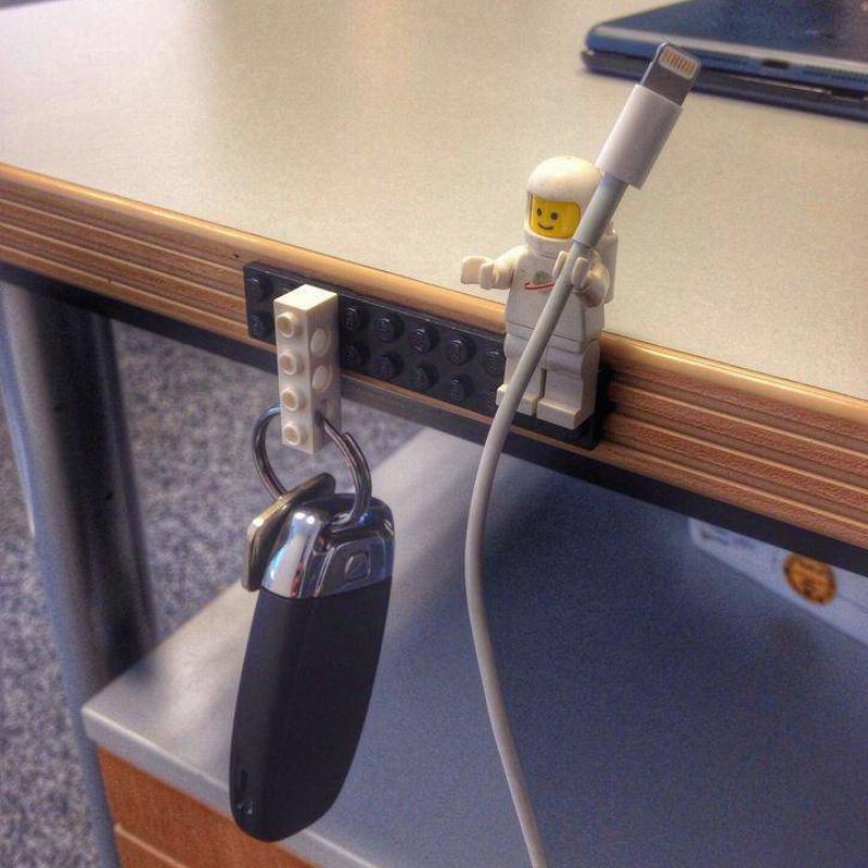 Lego man used to hold keys and cords 