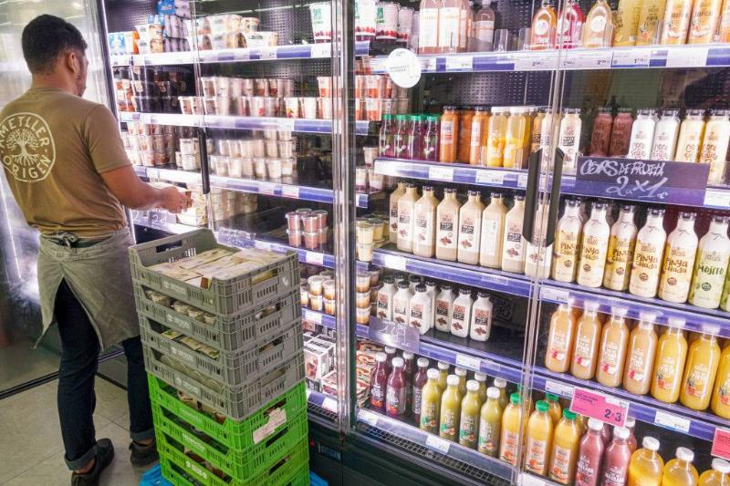 organic market dairy aisle, stocking