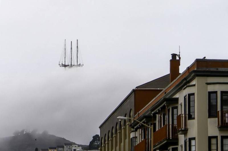 tower hidden in fog that looks like ship