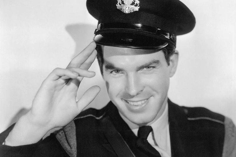 MacMurray in a police uniform 