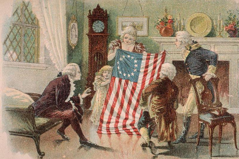 Betsy Ross showing off the flag