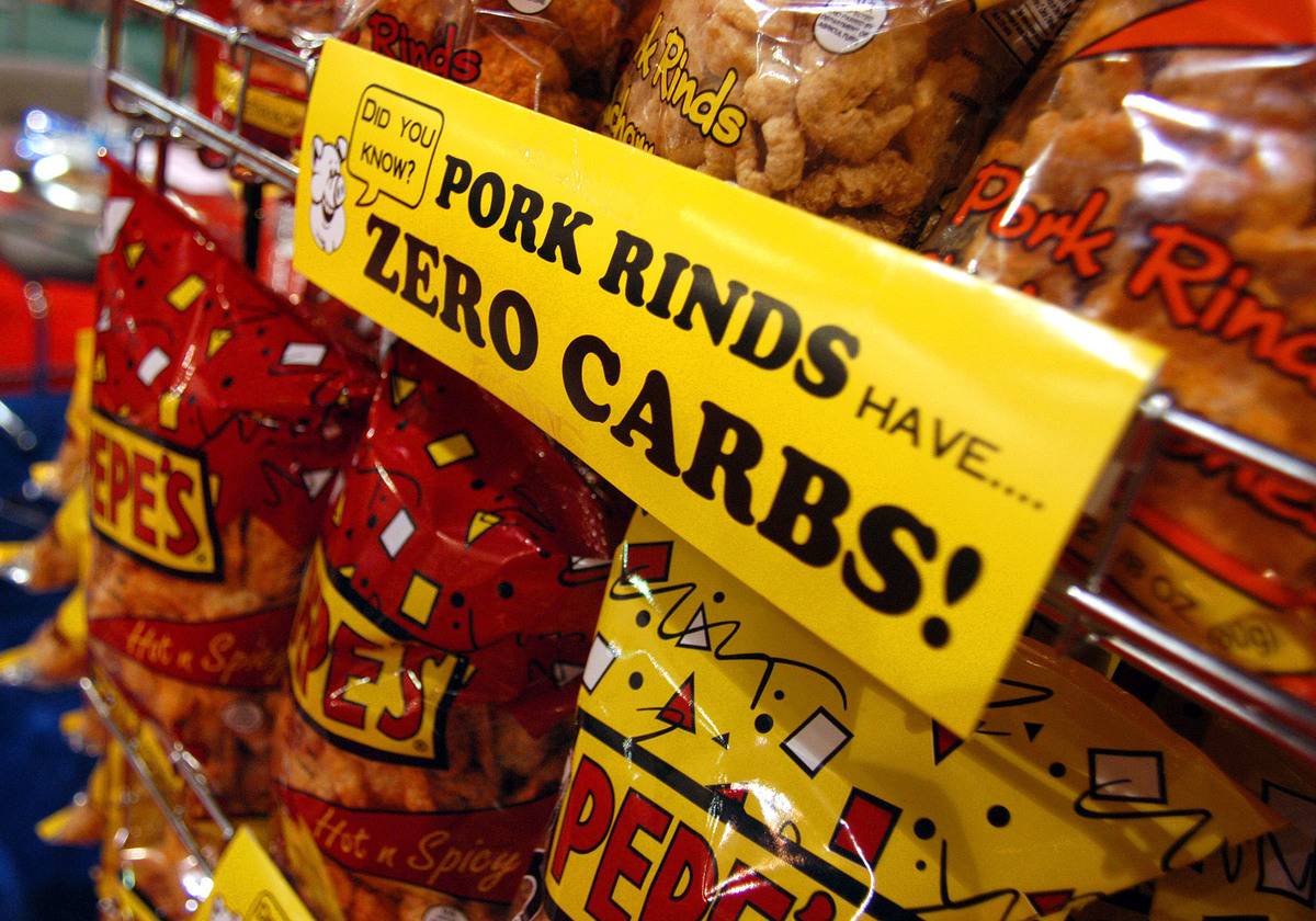 A sign labels pork rinds with zero carbs.