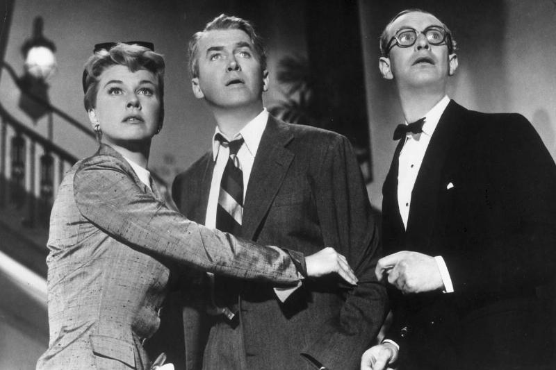 Doris Day and James Stewart look scared in a still from the movie The Man Who Knew Too Much.