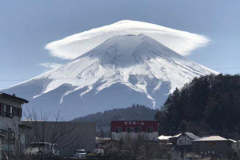 Mountain Covered by pointy cloud looks like hat