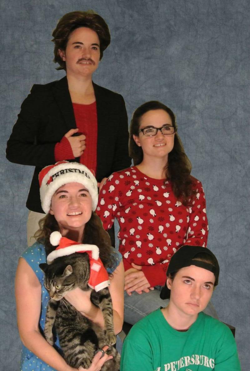 family woman dressed up as every character in a