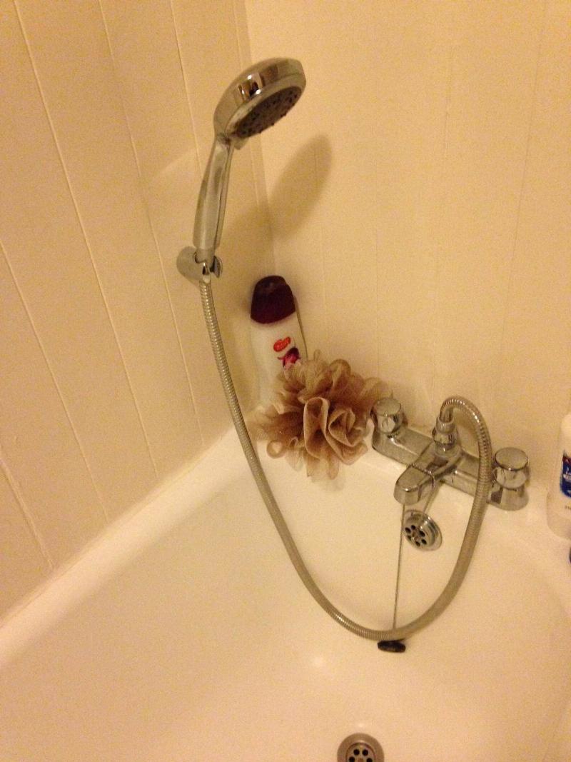 short shower head very short shower head