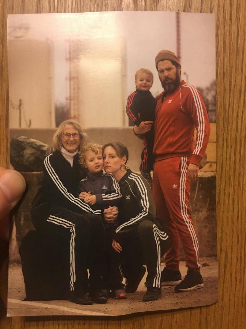 tracksuits family all wearing adidas tracksuits