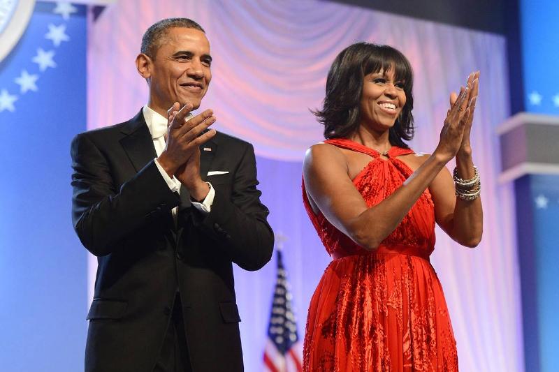Michelle's second dress-159867523 Barack Obama and first lady Michelle Obama arrive together for the 2013 Inaugural Ball.