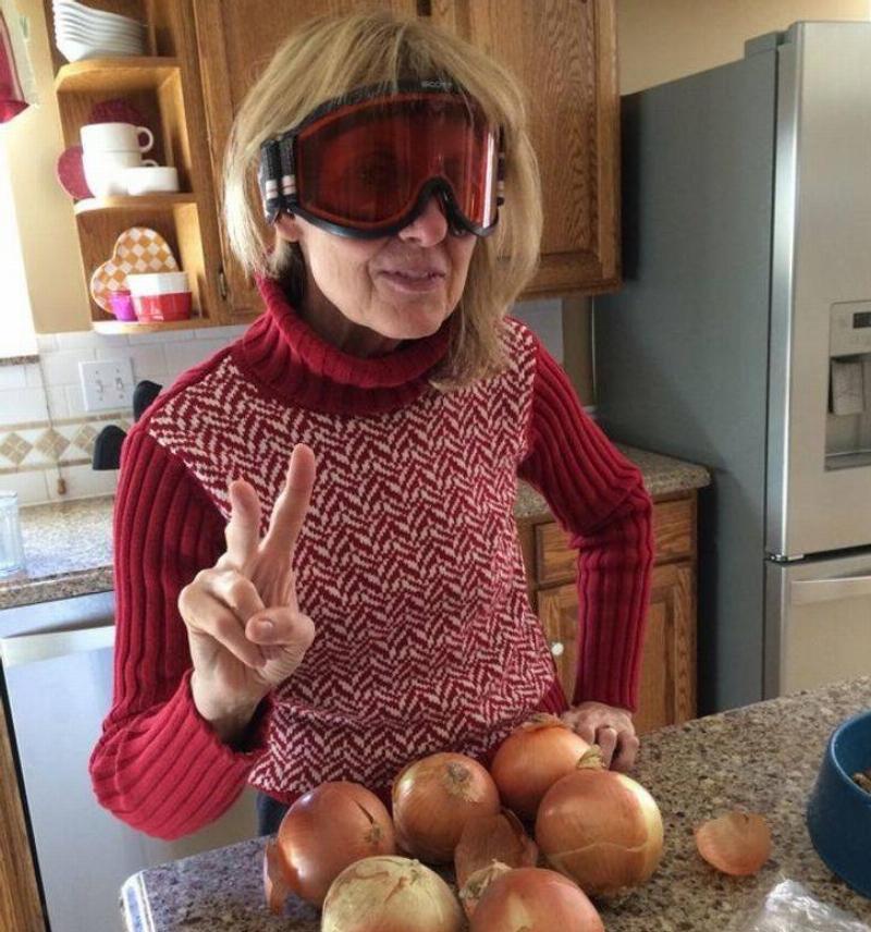 mom wearing goggles to chop onions