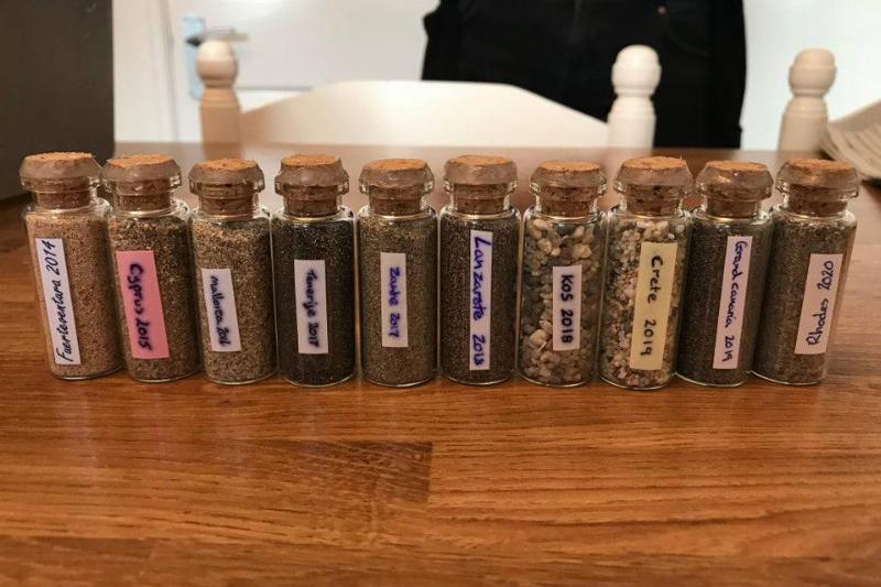 tiny jars of sand from various beaches