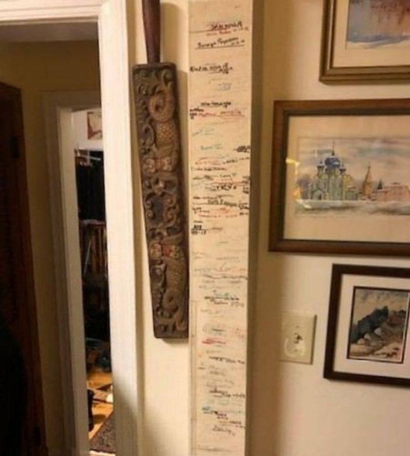 markings of children's height on wall