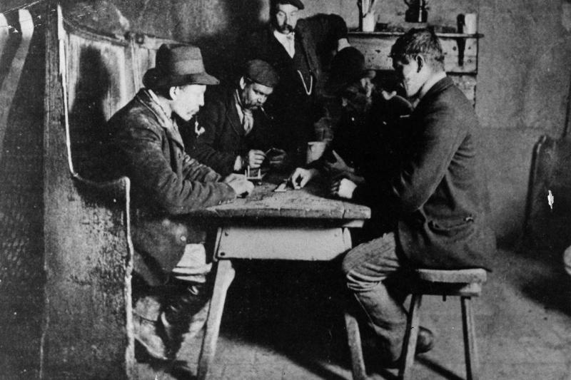 card games-3348719 Men play card games in a tavern in 1860.