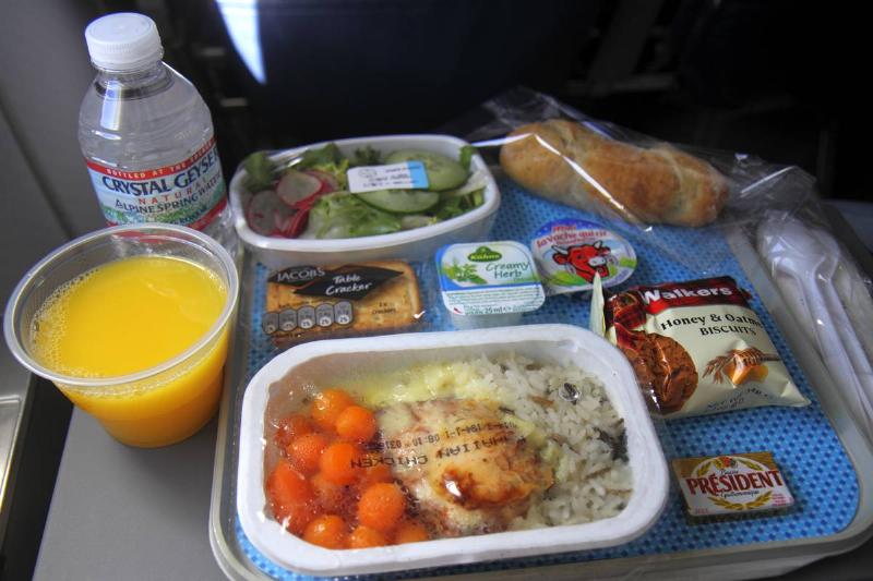 Paris, Charles de Gaulle Airport American Airlines economy seat in-flight meal orange juice Paris, Charles de Gaulle Airport American Airlines economy seat in-flight meal orange juice