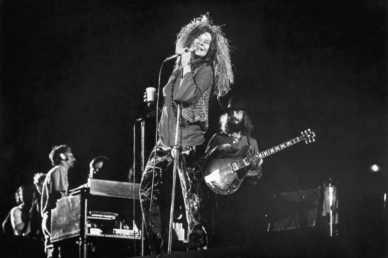 Janis Joplin and her final group, the Full Tilt Boogie Band, perform at the Festival for Peace at Shea Stadium.