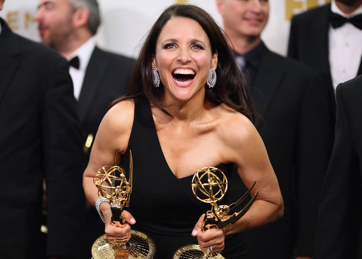Actress Julia Louis-Dreyfus holds Emmy Awards for Outstanding Lead Actress in a Comedy Series for 'Veep.'