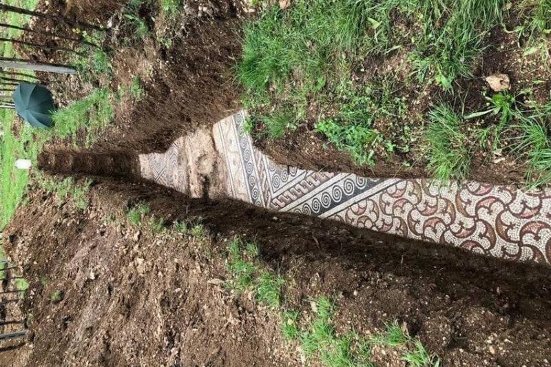 mosaic floor found under dirt