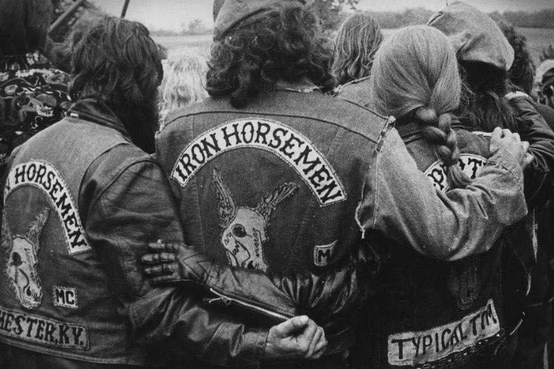 iron horsemen Members of the Iron Horsemen motorcycle club wrap their arms around each other.